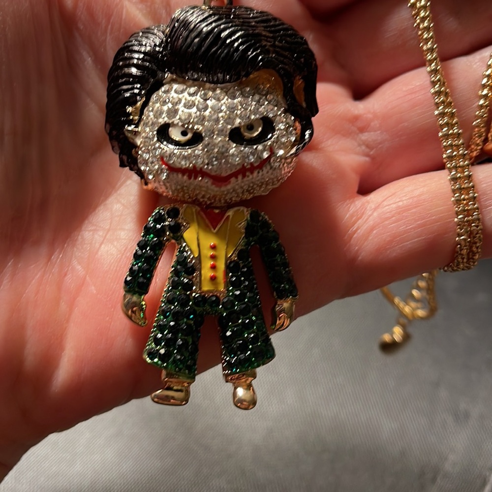 JOKER NECKLACE IN HIS GREEN TUXEDO